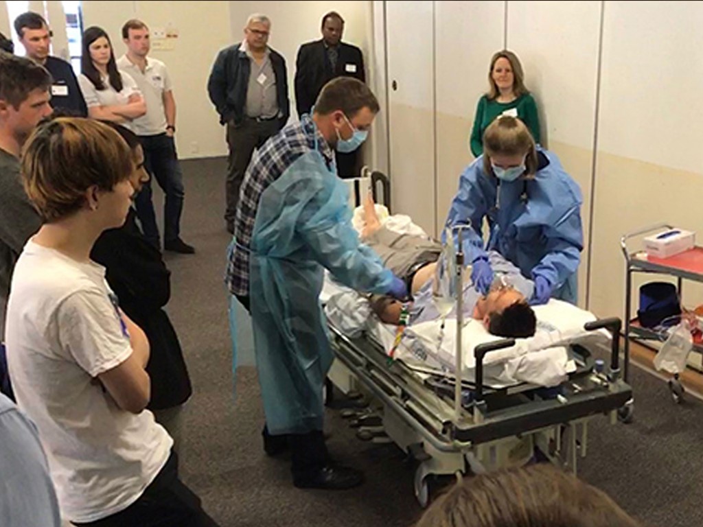 Some of the course participants engaged in an exercise under the watchful eye of BOPDHB Medical Leader and Clinical Director for Tauranga ICU/HDU Troy Browne.